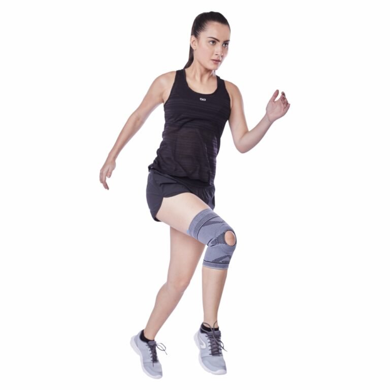 Woman wearing a knee cap for women during exercise