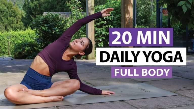 Woman practicing Vinyasa Flow Yoga for weight loss with flowing poses to improve strength, flexibility, and fitness.